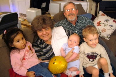 MommaSue and PoppaJim with all of us grandkids