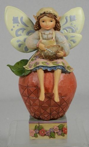 Mixer of Enchantment -
                                    Fairy/Angel with Mixing Bowl on Top
                                    of an Apple